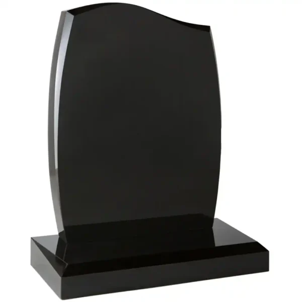 Half Ogee Shaped Top Memorial with barrell sides and facets with a chamfered base