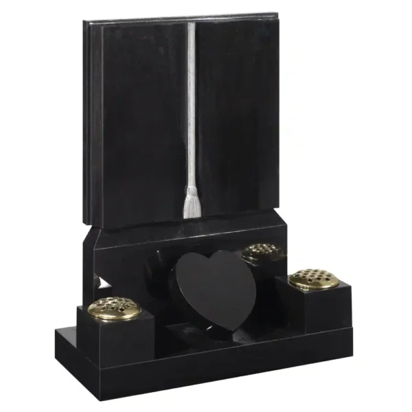 Book memorial with shaped pages and cord and tassel with two flower vases & a heart shaped plaque sitting on a rectangular base.