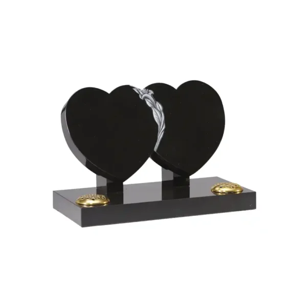 Double heart shaped memorial with a carved and highlighted lily design to centre of the hearts and two flower holes.