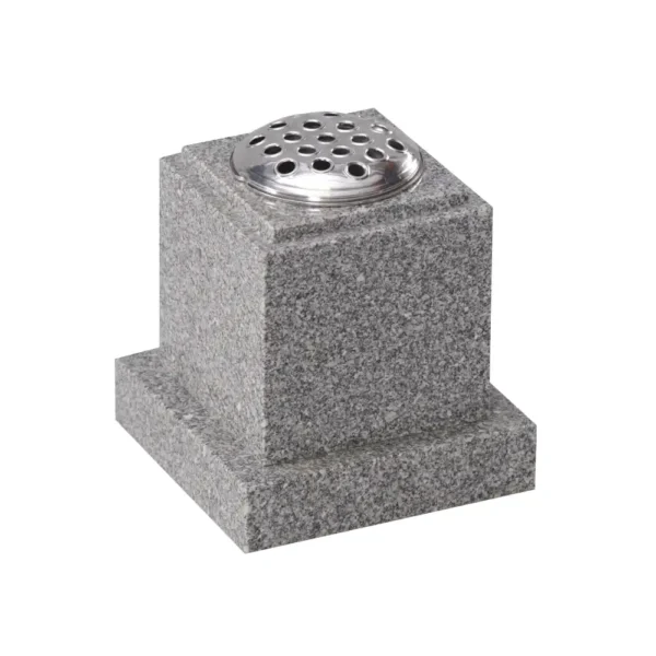 Cubed memorial vase with a checked top and a square base.