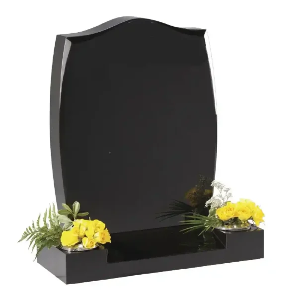 Ogee Shaped Top Memorial with barrell sides and facets with a centre splayed base and two flower holes